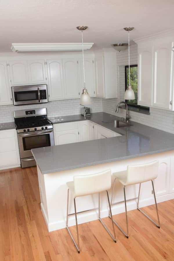 Classic White Domestic Kitchen with Subway Tile and Quartz